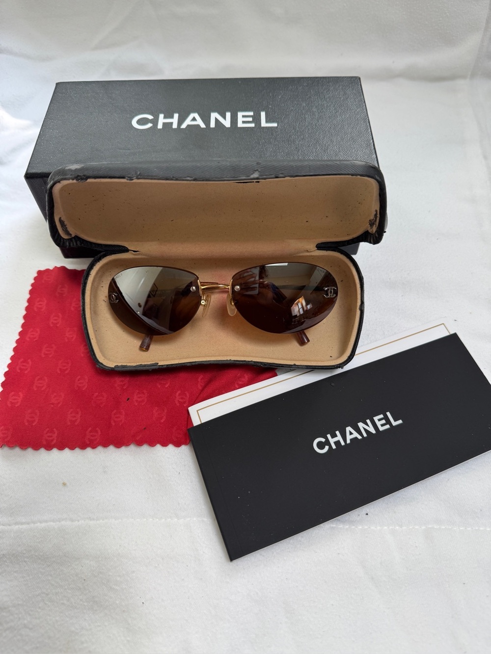 CHANEL Gold Frame Sunglasses with Brown Gradient Lenses
Authentic